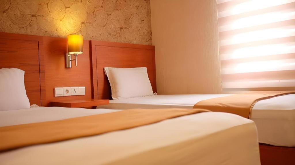 Amaya Suites Hotel Kejayan Extérieur photo
