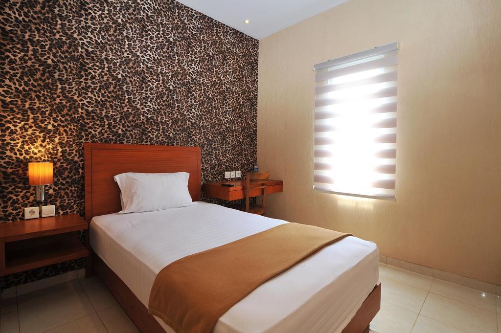 Amaya Suites Hotel Kejayan Extérieur photo